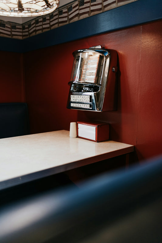 a machine sitting on top of a wooden table