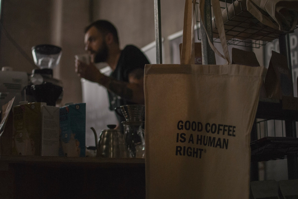 man standing front of coffeemaker