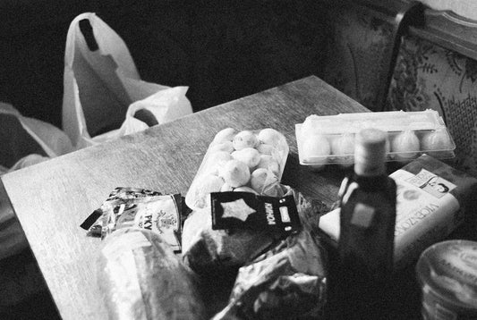 a wooden table topped with lots of food