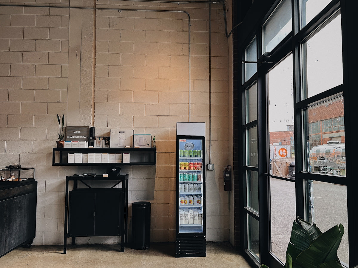 a refrigerator in a room next to a window
