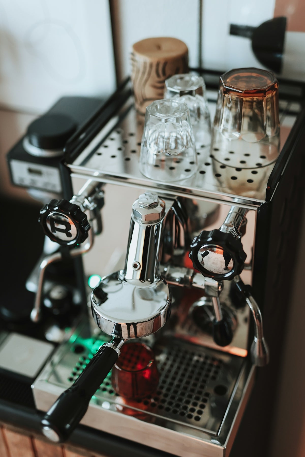 an espresso machine sitting on top of a counter